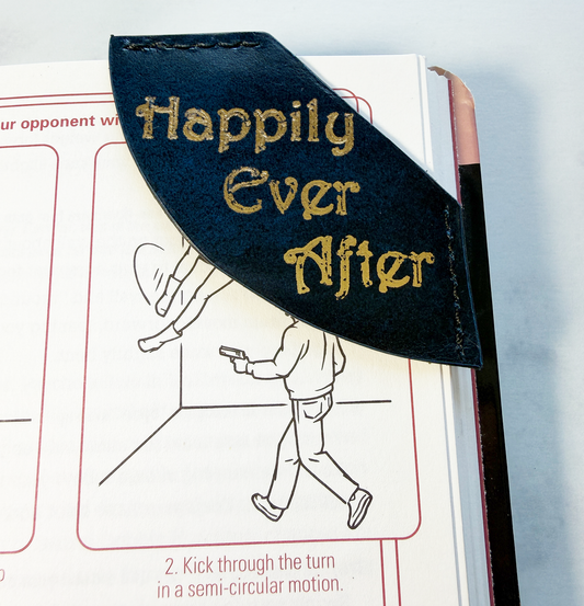 Blue & black leather bookmark with 'Happily Ever After' in gold text on a book